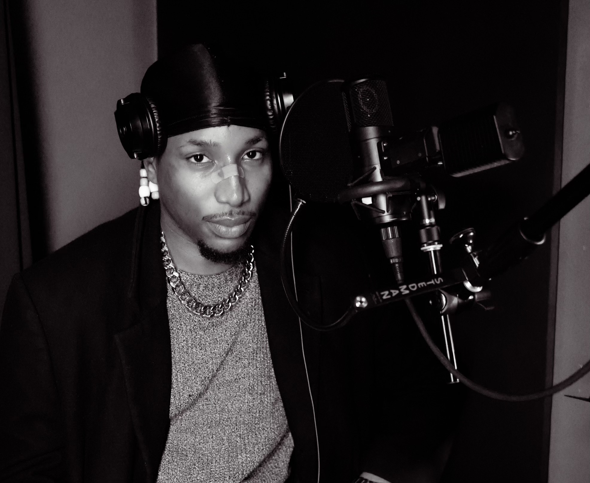 Rock Benjamins in the studio at the microphone