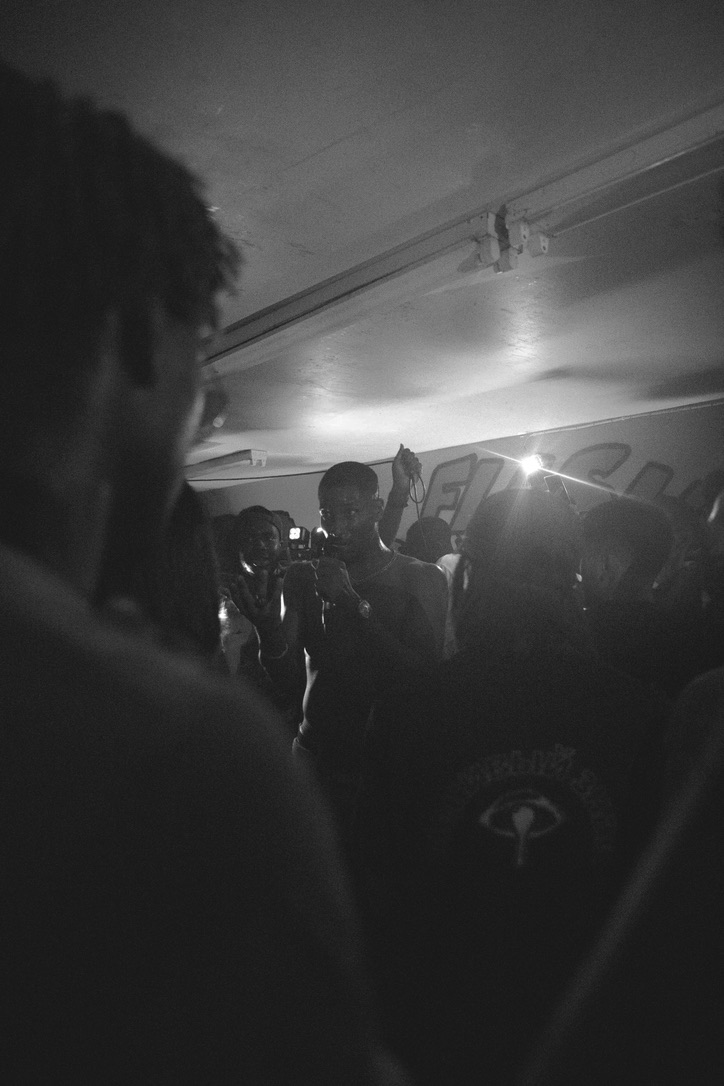 Rock Benjamins performing in a packed room